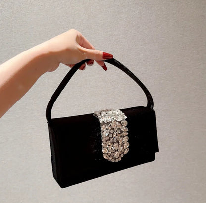 Women’s crystal elegant square buckle handbag in black.