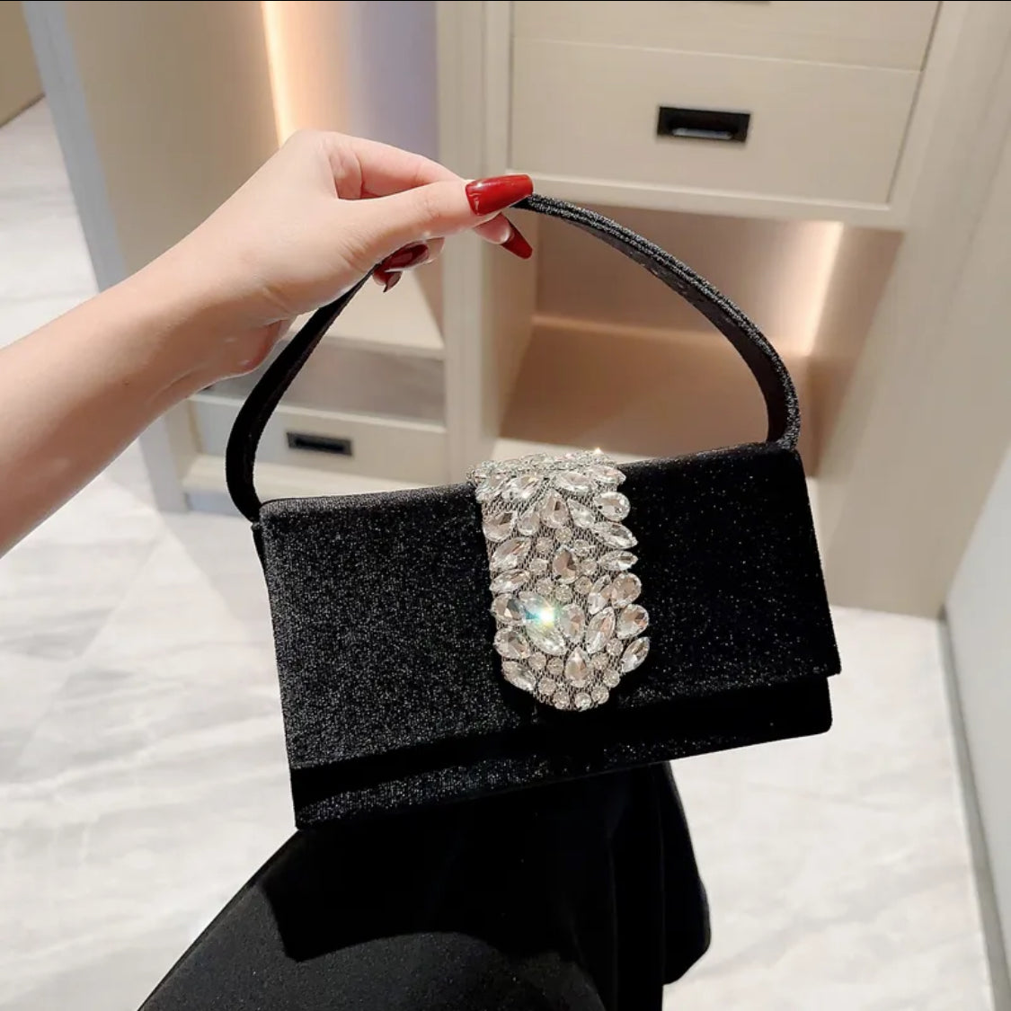 Women’s crystal elegant square buckle handbag in black.