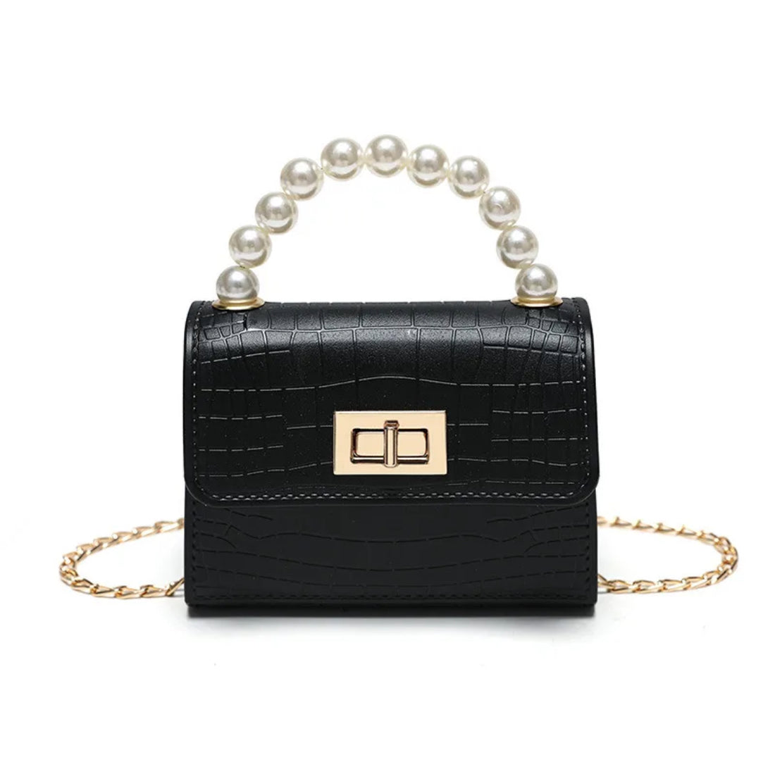 Women’s small lock clasp jelly bag.